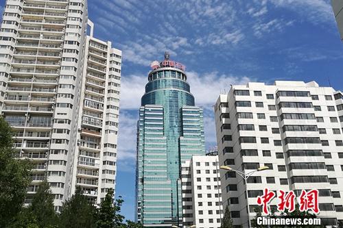 資料圖：北京市亞運村北辰附近某小區(qū)樓外景。<a target=&apos;_blank&apos; href=&apos;http://www.chinanews.com/&apos; _fcksavedurl=&apos;http://www.chinanews.com/&apos; ></table><p align=